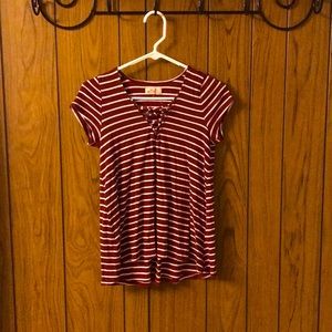 Maroon striped Hollister shirt.